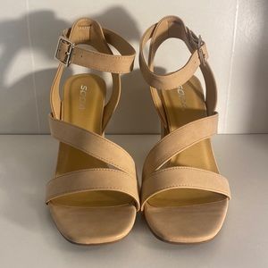 The Reena Faux Nubuck Heel. Size 10. Brand new, never worn.